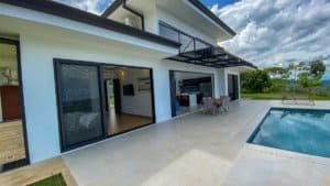 Modern Costa Rica home with pool, outdoor patio, and mountain views.