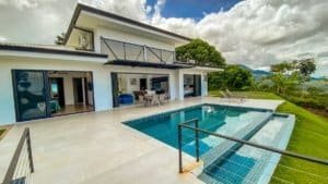 Modern luxury home with pool, panoramic mountain and ocean views in Dominical.