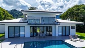 Modern Costa Rican home with pool, panoramic ocean and mountain views.