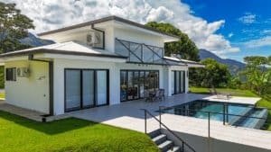 Modern Costa Rica home with pool, mountain, and ocean views.