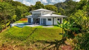 Modern Costa Rican home with panoramic ocean and mountain views.
