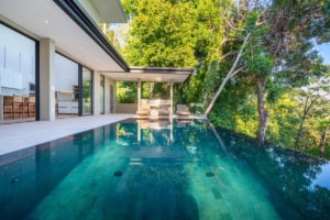 Modern tropical home with infinity pool and lush forest views in Dominical.