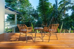 Outdoor balcony with wooden floor and tropical plants in Dominical, Costa Rica.