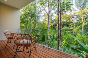 Balcony overlooking lush tropical forest in Dominical, Costa Rica.