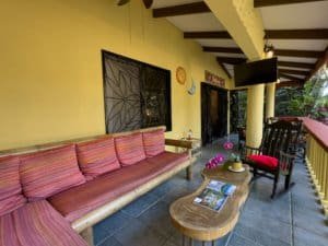 Balcony with seating and tropical surroundings in Dominical.