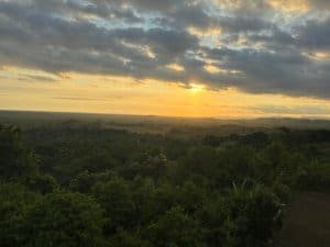Beautiful sunset view over lush rainforest in Dominical, Costa Rica.