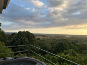 Panoramic view of ocean and mountains from a balcony in Dominical, Costa Rica.