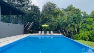 Infinity pool with mountain and jungle views in Dominical, Costa Rica.