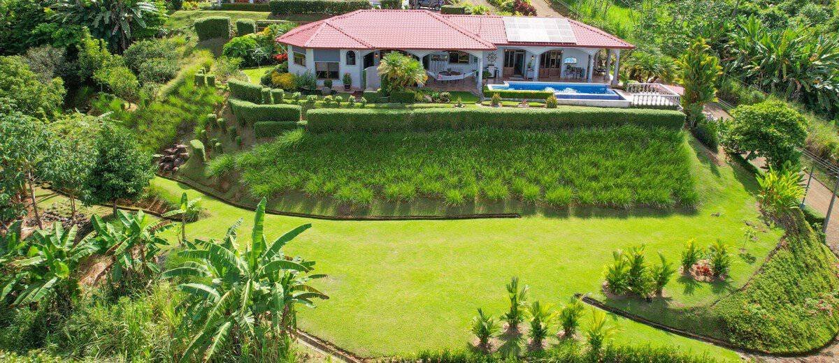 Beautiful tropical hacienda with pool and lush gardens in Dominical, Costa Rica.