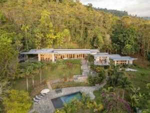 Modern luxury home with pool and mountain views in Dominical.
