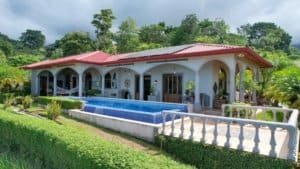 Beautiful tropical hacienda with pool and white water ocean view in Costa Rica.