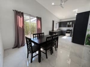 Bright modern kitchen and dining space in Dominical Costa Rica.