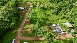 Build-ready 0.2-acre private home site in Uvita hills with lush greenery.
