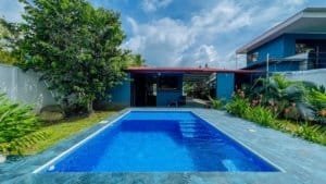 Beautiful private pool at a charming Costa Rican home with lush garden.