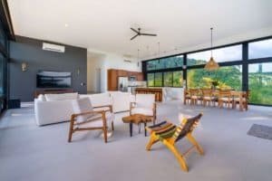 Spacious living room with panoramic ocean views and modern decor in Costa Rica.