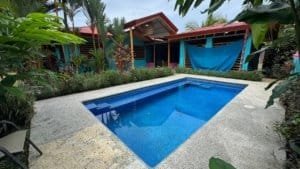 Private villa with pool, lush garden, and tropical surroundings in Dominical.
