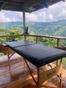Relaxing massage table with mountain view in Dominical, Costa Rica.