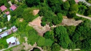 Build-ready land with lush greenery and mountain views in Dominical, Costa Rica.