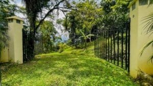 Gated entrance to a lush tropical property in Dominical, Costa Rica.