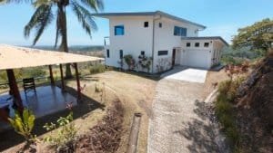Contemporary home in Dominical with panoramic ocean, mountain, and sunset views.