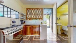 Cozy kitchen in Dominical with pool access and walk-to-everything location.