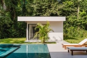 Modern Costa Rican home with pool and lush greenery in Dominical.