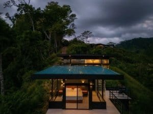 Modern home with panoramic ocean views and lush green surroundings in Dominical.