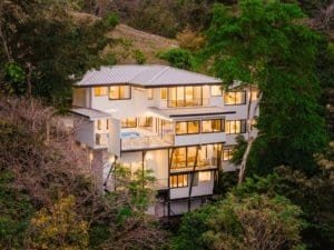 Modern multi-story house with ocean and jungle views in Costa Rica.