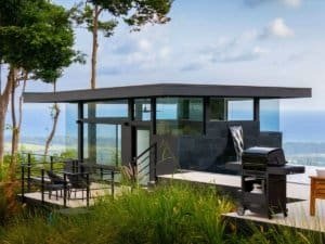 Modern Costa Rica home with panoramic ocean views and outdoor grill.