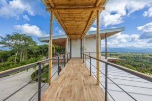 Balcony with mountain views at Dominical luxury estate in Costa Rica.