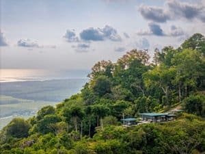 Luxury home with panoramic ocean views and lush greenery in Dominical.