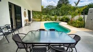 Modern Costa Rican home with private pool and lush garden view.
