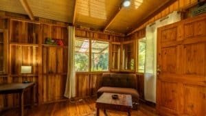 Warm wooden interior of a mountain home near Nauyaca Waterfalls in Dominical.