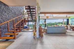 Spacious living room with mountain views, stylish furniture, and open design.