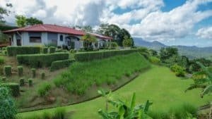 Beautiful tropical hacienda with white water view and lush gardens in Costa Rica.