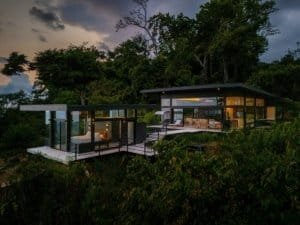 Modern luxury home with panoramic ocean views and glass walls in Dominical.