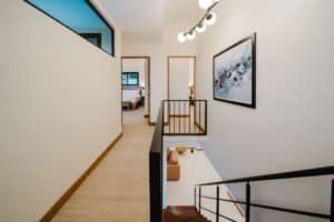 Bright, modern interior with staircase and artwork in Costa Rica estate.