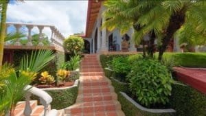 Beautiful tropical garden and stairs leading to a house in Costa Rica.