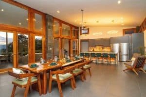 Spacious dining room with large windows and mountain views in Costa Rica.