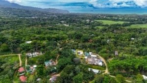 Aerial view of lush green landscape near Dominical and Marino Ballena.