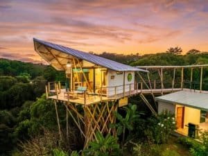 Treehouse with modern design and mountain views in Dominical, Costa Rica.