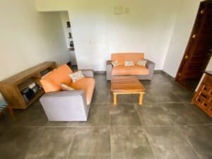 Comfortable living room with sofas, coffee table, and modern decor in Dominical.