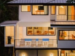 Modern Costa Rican estate with ocean and jungle views, spacious balconies, and elegant interiors.