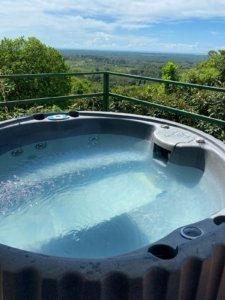 Hot tub with ocean and mountain views in Dominical, Costa Rica.