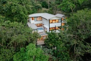 Modern house nestled in lush rainforest near Dominical, Costa Rica.