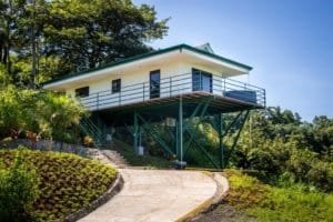 Modern house on stilts with mountain and ocean views in Dominical.