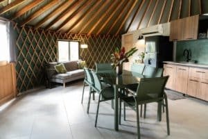 Interior of a cozy Dominical vacation home with modern decor and wooden accents.