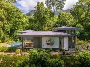 Modern Japanese-style home surrounded by lush tropical jungle in Dominical.