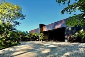 Contemporary house with lush tropical landscaping in Dominical, Costa Rica.