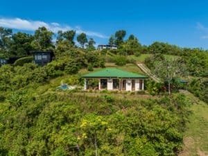 Whitewater ocean view home with infinity pool and lush garden in Dominical.